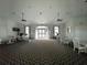 Bright and spacious community room with plenty of seating at 660 Silk Oak Dr, Venice, FL 34293