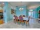 Dining room with table and chairs near entryway at 660 Silk Oak Dr, Venice, FL 34293