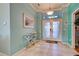 Entryway with double doors and a decorative table at 660 Silk Oak Dr, Venice, FL 34293
