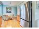 Kitchen with breakfast nook and stainless steel refrigerator at 660 Silk Oak Dr, Venice, FL 34293