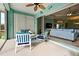 Covered lanai with seating area, perfect for relaxing at 660 Silk Oak Dr, Venice, FL 34293
