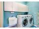 Laundry room with washer, dryer, and utility sink at 660 Silk Oak Dr, Venice, FL 34293