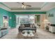 Bright living room with view of the pool and lanai at 660 Silk Oak Dr, Venice, FL 34293