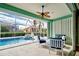 Inviting pool and spa with screened enclosure at 660 Silk Oak Dr, Venice, FL 34293