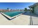 Community pool with spacious deck at 660 Silk Oak Dr, Venice, FL 34293