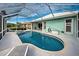 Relaxing pool and patio with screened enclosure at 660 Silk Oak Dr, Venice, FL 34293