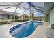 Spacious pool and patio with screened enclosure at 660 Silk Oak Dr, Venice, FL 34293
