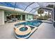 Enjoy this refreshing pool and patio area at 660 Silk Oak Dr, Venice, FL 34293
