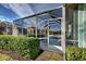 Large screened pool with a view of the backyard at 660 Silk Oak Dr, Venice, FL 34293