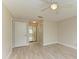 Primary bedroom with mirrored closet doors and bathroom access at 7022 W Country Club N Dr # 132, Sarasota, FL 34243