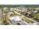 Residential neighborhood featuring single-Gathering homes and mature trees at 7321 Teaberry St, Englewood, FL 34224