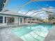 A beautiful screened-in pool connected to the home's patio for seamless indoor/outdoor living at 7321 Teaberry St, Englewood, FL 34224