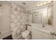 Clean bathroom featuring a shower-tub combo, white vanity, and coordinated decor at 801 Waterside Dr # 102, Venice, FL 34285
