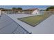 Community bocce ball court with seating area at 801 Waterside Dr # 102, Venice, FL 34285