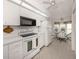 Well-equipped kitchen with white cabinetry and a breakfast nook at 801 Waterside Dr # 102, Venice, FL 34285