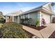 Landscaped walkway leading to the entrance of the house at 821 Harrington Lake Ln # 32, Venice, FL 34293