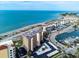 Aerial view of beachfront condo building and parking at 840 The Esplanade N # 703, Venice, FL 34285