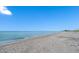 Expansive beach view with calm ocean waters at 840 The Esplanade N # 703, Venice, FL 34285