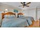Guest bedroom with two twin beds and ceiling fan at 840 The Esplanade N # 703, Venice, FL 34285