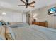 Guest bedroom with two twin beds and built-in closet at 840 The Esplanade N # 703, Venice, FL 34285