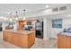 Well-equipped community kitchen with granite counters at 840 The Esplanade N # 703, Venice, FL 34285