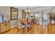 Charming dining room with wood table and chairs at 840 The Esplanade N # 703, Venice, FL 34285