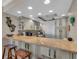 Well-equipped kitchen with granite counters and white cabinets at 840 The Esplanade N # 703, Venice, FL 34285