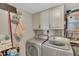 Convenient laundry room with washer and dryer included at 840 The Esplanade N # 703, Venice, FL 34285