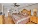 Main bedroom features a king-size bed and ample closet space at 840 The Esplanade N # 703, Venice, FL 34285