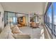Sunroom with access to balcony and ocean view at 840 The Esplanade N # 703, Venice, FL 34285