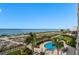 Relaxing pool area with ocean view at 840 The Esplanade N # 703, Venice, FL 34285