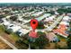 Property location shown via aerial view of the surrounding neighborhood at 1035 Beckley Cir, Venice, FL 34292