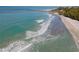 Aerial of surfers in ocean waves near beach at 1035 Beckley Cir, Venice, FL 34292