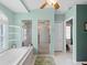 Bathroom with shower, tub, and built-in shelving at 1035 Beckley Cir, Venice, FL 34292