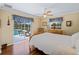 Bedroom with pool view and sliding glass doors at 1035 Beckley Cir, Venice, FL 34292