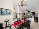 Open dining room with view into the living room and pool at 1035 Beckley Cir, Venice, FL 34292