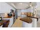 Galley-style kitchen with stainless steel appliances and wood countertops at 1035 Beckley Cir, Venice, FL 34292