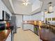 Galley-style kitchen with stainless steel appliances and wood countertops at 1035 Beckley Cir, Venice, FL 34292