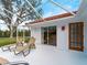 Spacious pool deck with lounge chairs and screened enclosure at 1035 Beckley Cir, Venice, FL 34292
