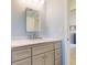 Clean bathroom with gray vanity and marble countertop at 104 Woodingham Dr, Venice, FL 34292