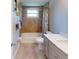 Clean bathroom with shower/tub combo, vanity, and tiled floors at 104 Woodingham Dr, Venice, FL 34292