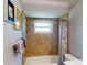 Tiled bathroom with shower/tub and updated fixtures at 104 Woodingham Dr, Venice, FL 34292