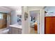 Updated bathroom with gray vanity, marble countertop, and shower/tub combo at 104 Woodingham Dr, Venice, FL 34292