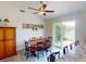 Bright dining area with water view at 104 Woodingham Dr, Venice, FL 34292