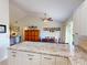 Bright kitchen with granite countertops and stainless steel appliances at 104 Woodingham Dr, Venice, FL 34292