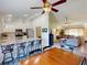Open kitchen features granite counters and stainless steel appliances at 104 Woodingham Dr, Venice, FL 34292