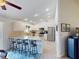L-shaped kitchen with granite countertops and stainless steel appliances at 104 Woodingham Dr, Venice, FL 34292