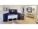 Spacious living room featuring a large TV and comfortable seating at 104 Woodingham Dr, Venice, FL 34292