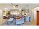 Living room with seating area and home office space at 104 Woodingham Dr, Venice, FL 34292