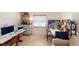 Home office with two desks, window, and additional seating at 104 Woodingham Dr, Venice, FL 34292